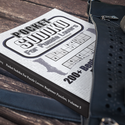 Pocket Sudoku book in a purse